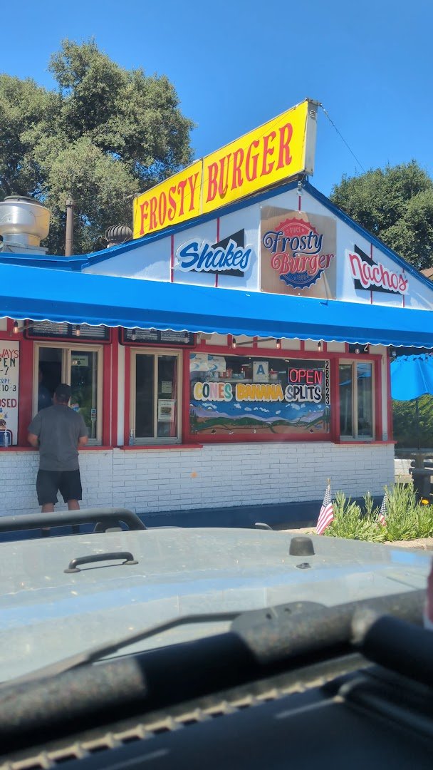 A banana split served in a classic diner style.