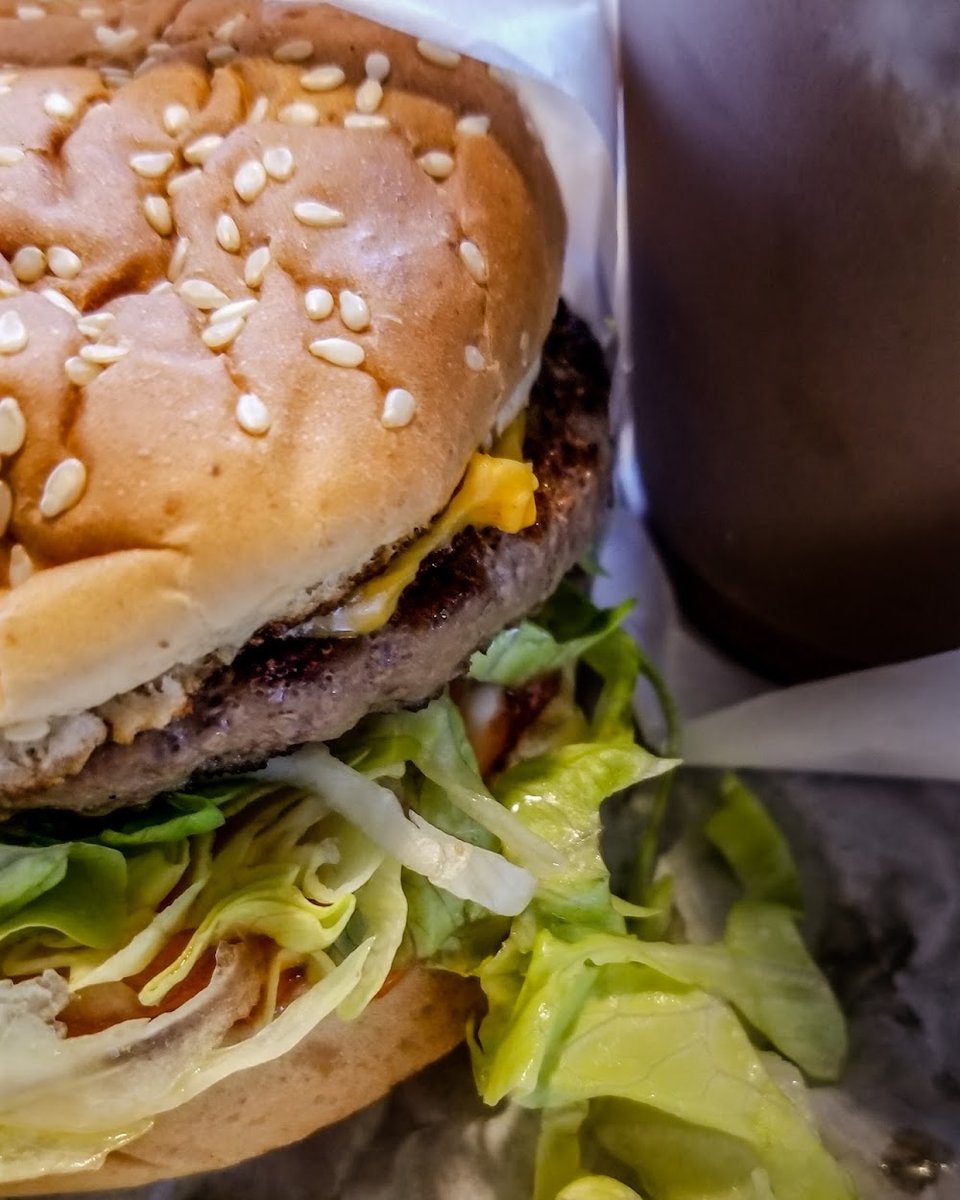 Burger menu page with shakes, fries, and desserts.