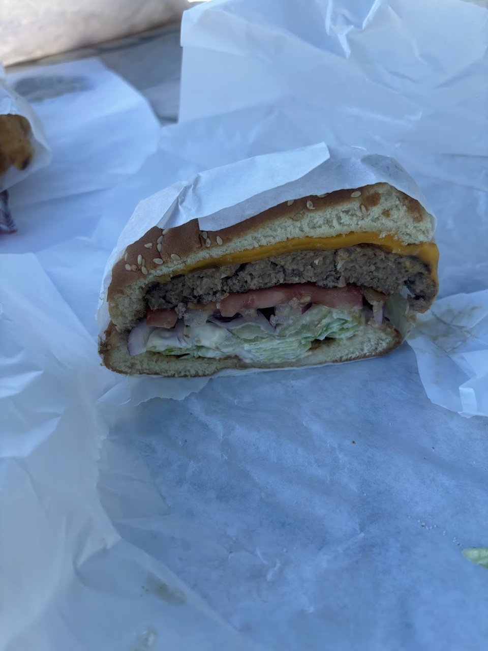Hamburger restaurant menu featuring burgers and hot dogs.